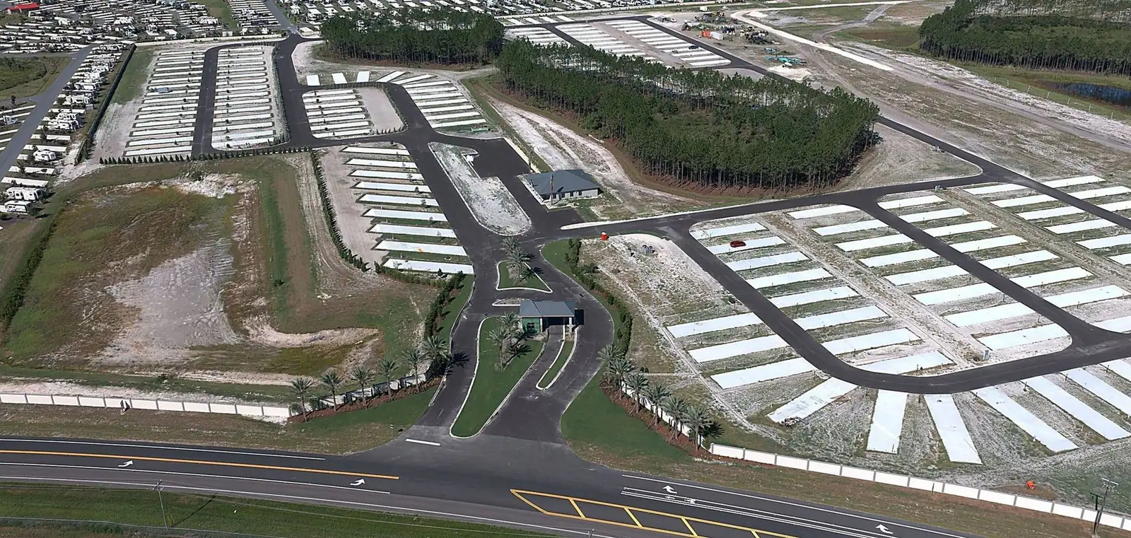 Aerial of an active project with work in place marked by line item